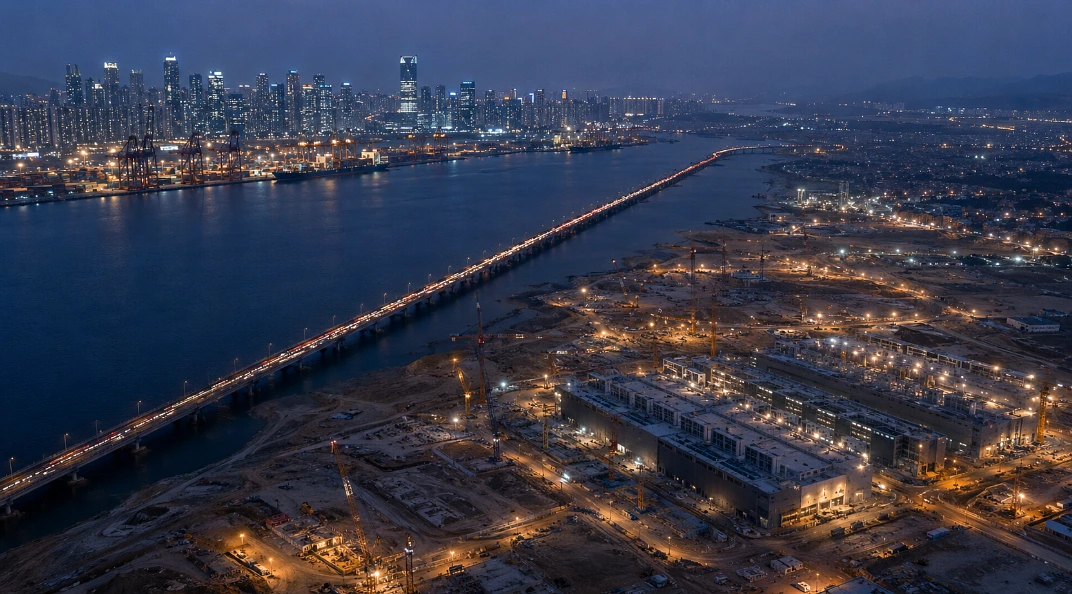 One side is growing quickly and the other sells the thing a fast-growing neighbour cannot manufacture, which is why they make more sense read together
