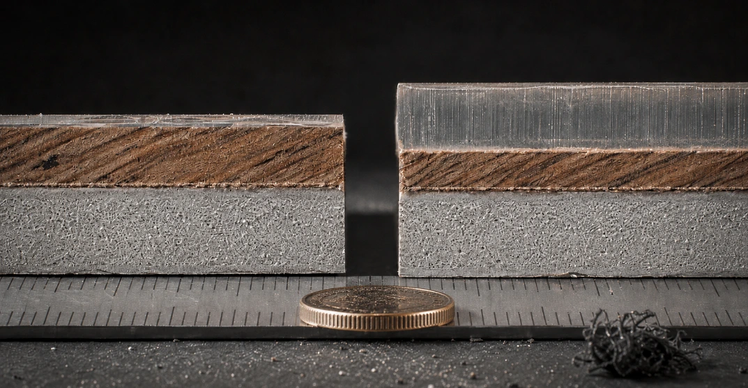 The wear layer is the entire difference between a floor that lasts and one that shows its traffic in two years