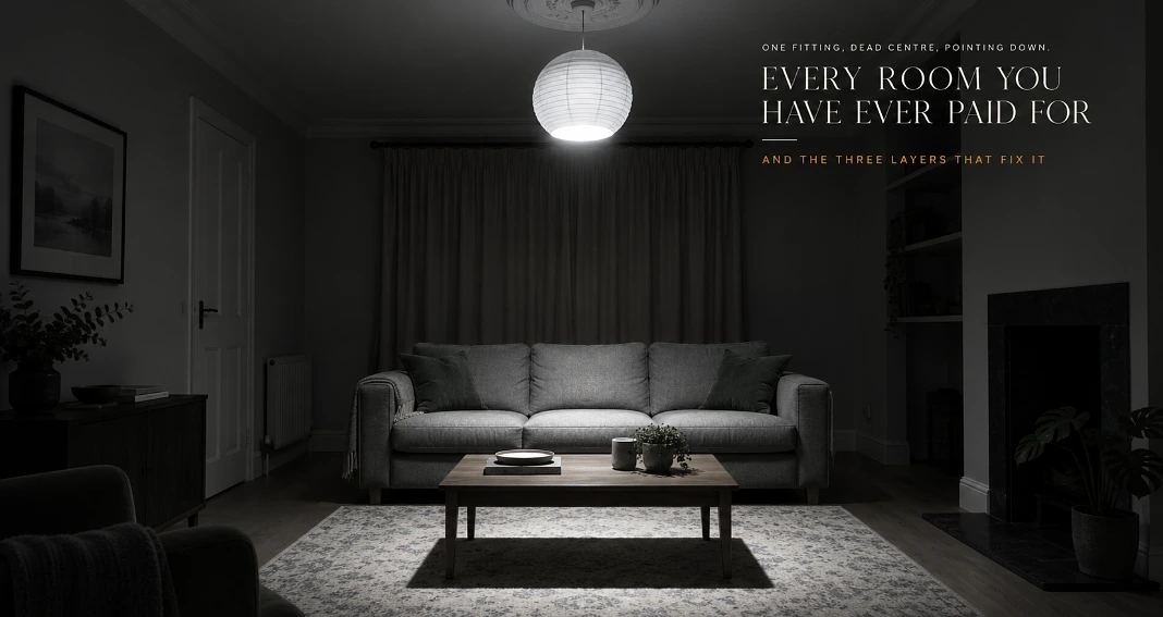 Living room at night lit only by a single central ceiling pendant, corners in shadow