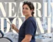 Magazine-style cover of a dentist holding an intraoral scanner wand in front of an oversized headline reading Nearly Done